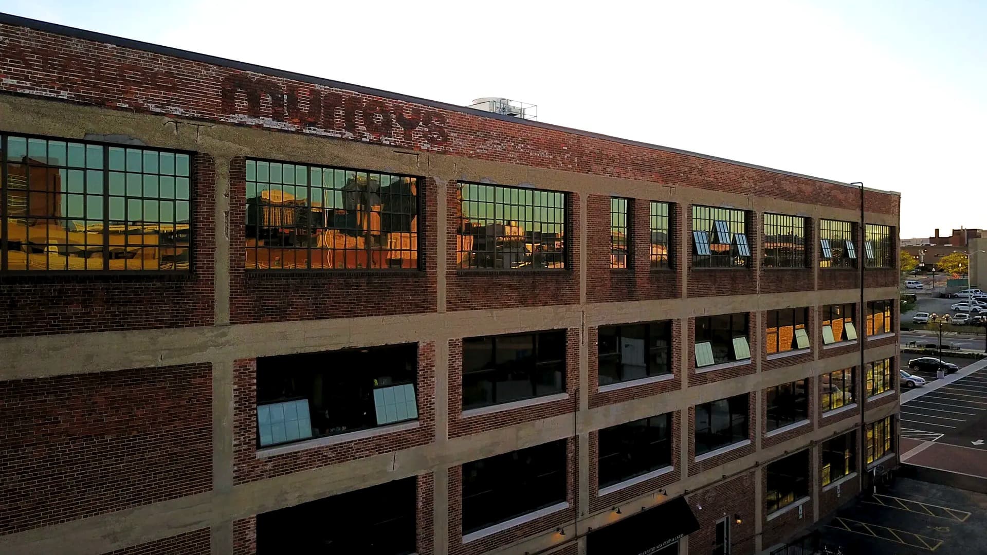 Original brick and factory-style windows at Murray Place