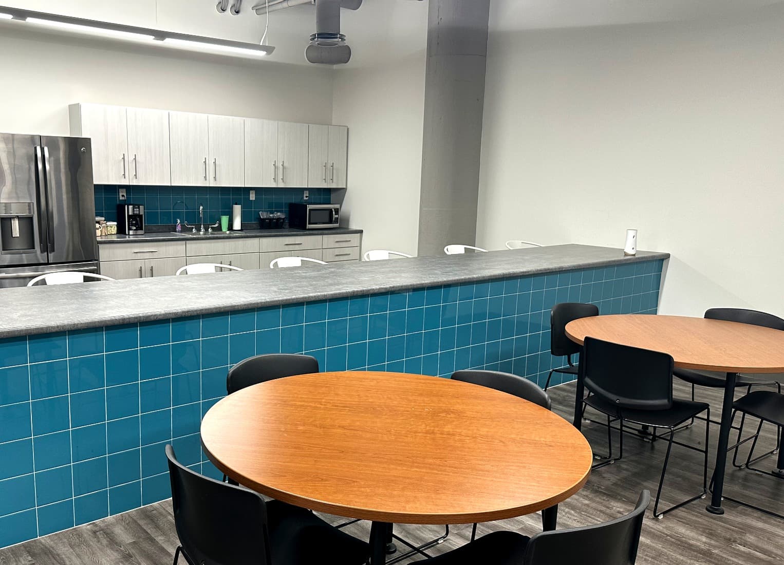 Kitchen counter seating and outlets at Murray Place Suites